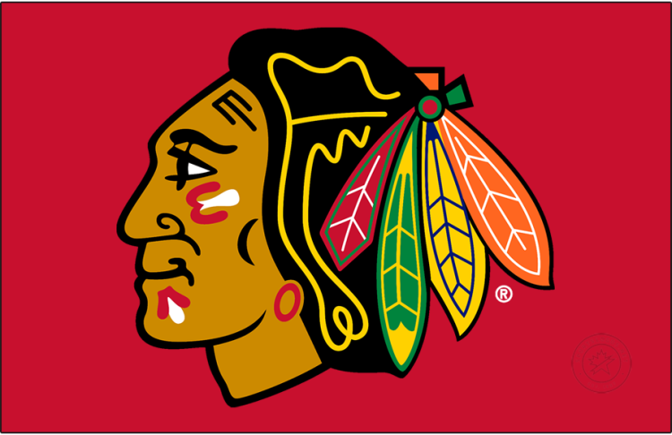 Chicago Blackhawks Logo Primary Dark Logo (1999/00-Pres) - The Chicago Blackhawks logo features the left-facing profile of a Native American head. It features a gold face with black used to show the eyes, nose, mouth, and hair. The head is shown wearing a series of coloured feathers in red, green, yellow, and orange. Prior to the 1999-2000 season, the Blackhawks altered the shade of red as well as the green and yellow used for the feathers. SportsLogos.Net
