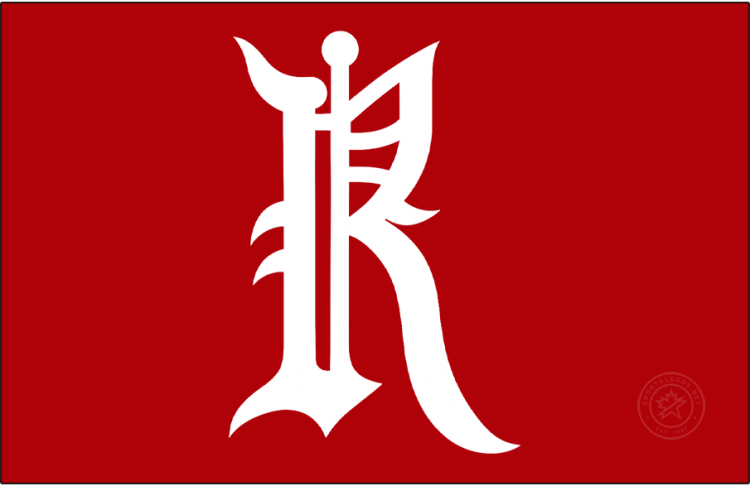Renfrew Creamery Kings Logo Primary Dark Logo (1909/10-1910/11) - The Renfrew Creamery Kings logo was a simple red calligraphic 'R' worn on the front of a white jersey with red striping. The team, one of the first professional hockey clubs, was also simultaneously known as the Renfrew Millionaires (due to their players' salaries) and the Renfrew Hockey Club. Seven Hockey Hall of Famers suited up for the Creamery Kings during their brief two-season run in the National Hockey Association. SportsLogos.Net