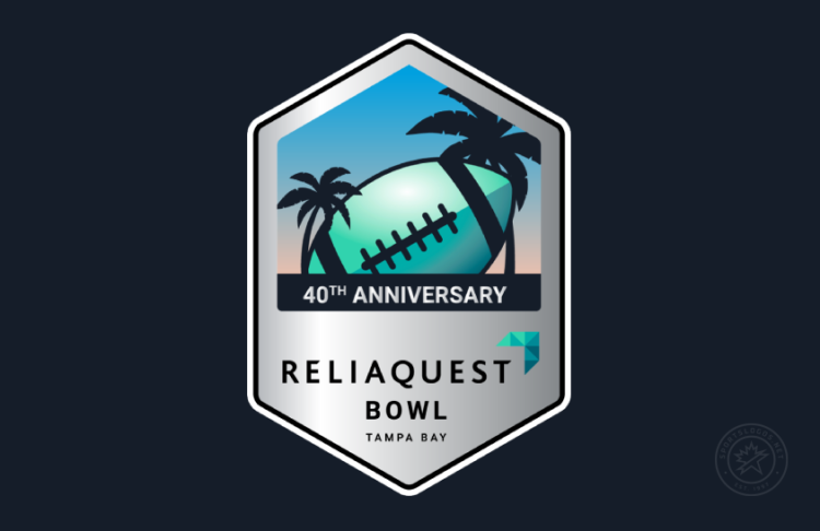 ReliaQuest Bowl Logo Primary Dark Logo (2025) - 40th Anniversary ReliaQuest Bowl logo featuring a tilted football with palm trees & a sunset above the ReliaQuest company logo and Tampa Bay text within a hexagon with silver (instead of blue) tones on blue background. SportsLogos.Net