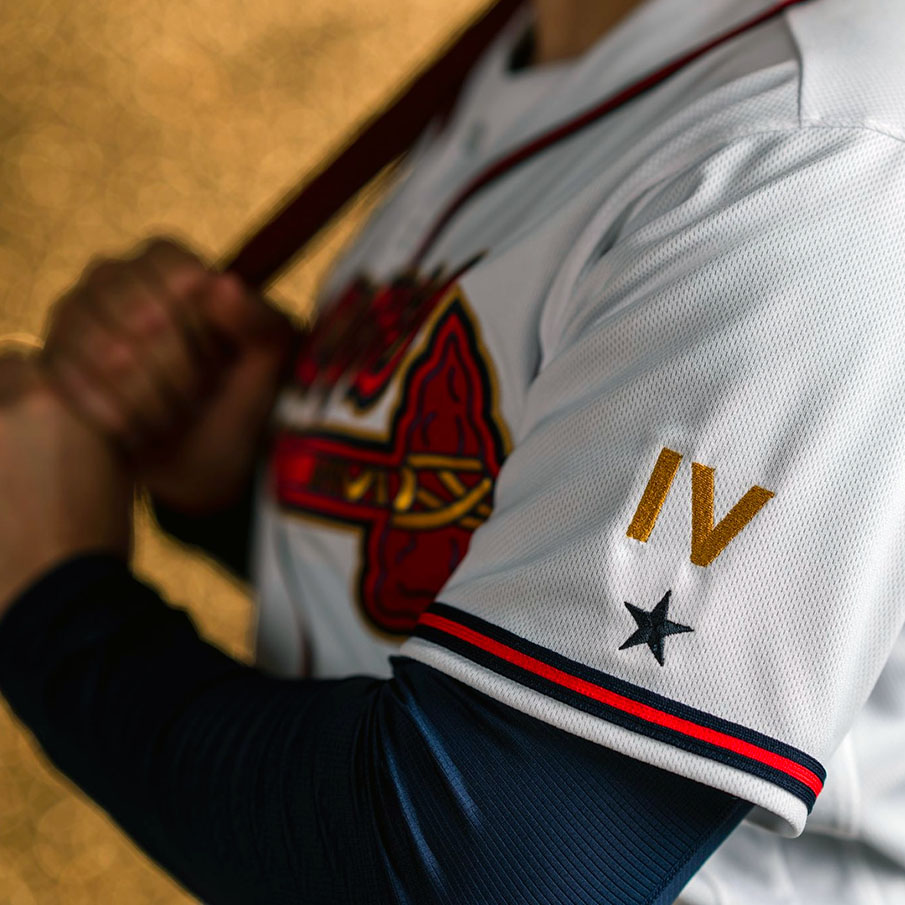 April 09, 2022: The Atlanta Braves logo outlined in gold on the jersey in  dedication to the 2021 World Series Championship during a MLB game against  the Cincinnati Reds at Truist Park